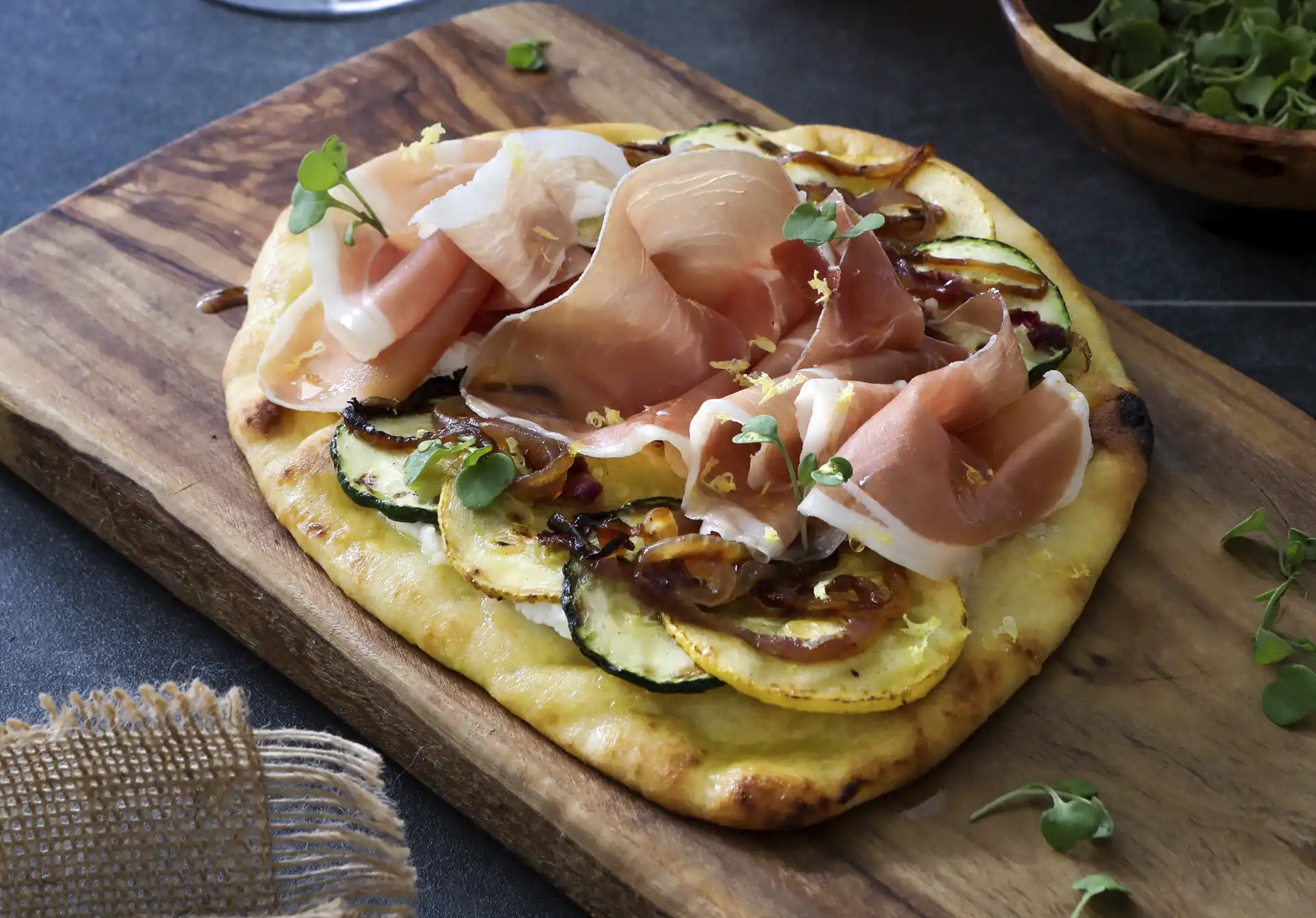 the kitchen doesnt bite r Ricotta Flatbread with Zucchini, Caramelized Onions, Lemon & ConsorcioSerrano Ham